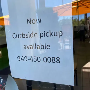 a sign in the window of a restaurant