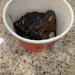 Burnt short ribs tasted awful.  This is a very small cup and it was all we got for $8.