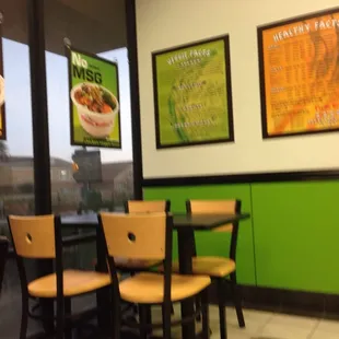 a table and chairs in a restaurant