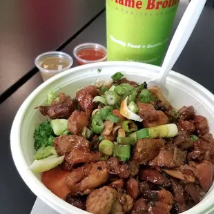 a bowl of food and a drink