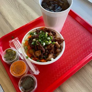 Regular Half &amp; Half, Brown Rice, Broccoli &amp; Carrots, Green Onions.  Topped with Magic Sauce, Hot Sauce &amp; Jalapeño&apos;s