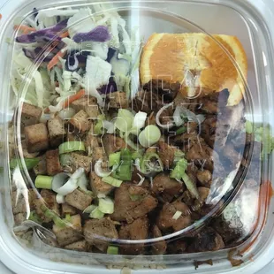 Plate with chicken and tofu. Brown rice and veggies