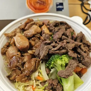 Regular size bowl - half chicken and half beef.  Good value, good taste.