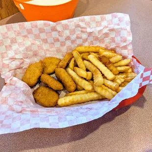 Chicken nuggets and crinkle-cut fries.