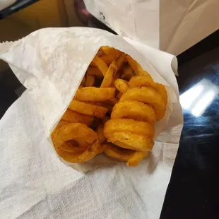 Larger curly fry. Crispy, hot, and fresh.