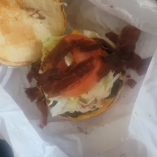 No mayo, ketchup, mustard...nothing.  I didn&apos;t order the Burger dry. And look at that burnt crumbled up bacon.