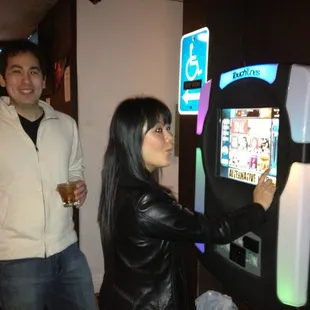 My sister and friend picking music from the jukebox!