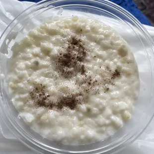 White and green mold on rice pudding