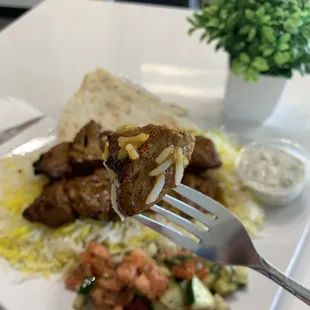 a plate of food with a fork