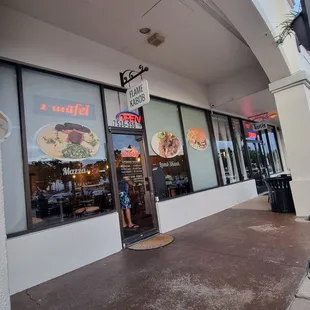 the entrance to a restaurant