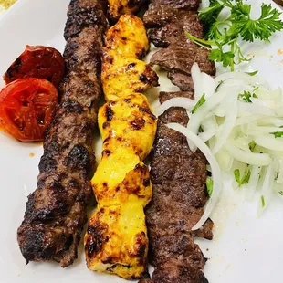 a plate of grilled meat and vegetables