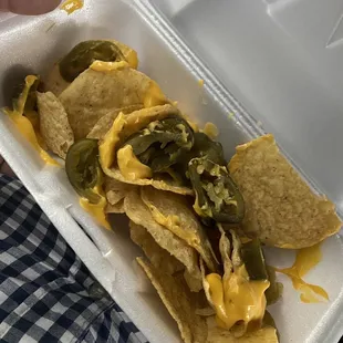 I paid $4 for what they call &quot;nachos&quot;. Where&apos;s the cheese?!