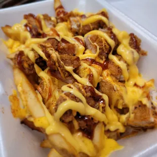 Loaded Cheese Fries with Crispy Chicken on Top