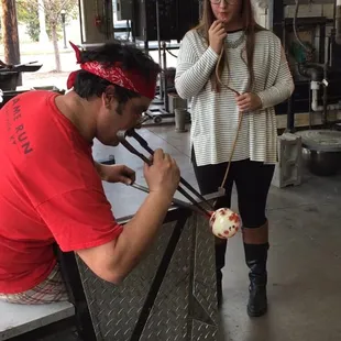 My daughter blowing her Christmas ornament with Rudy... he was awesome!
