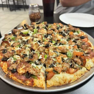 Half is Creamy Garlic Combination Pizza and Combination Pizza