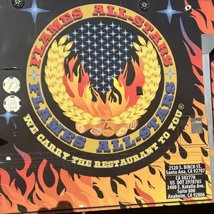 a man standing in front of a food truck