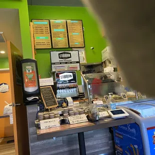 a view of a restaurant counter