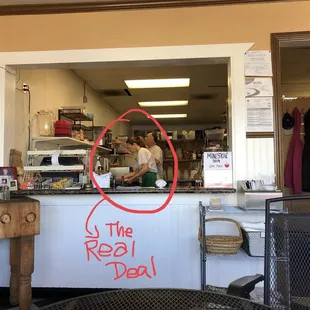 Deli counter and kitchen, plus staff!