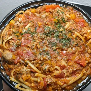 Linguini w/ ground Italian chicken sausage, mushrooms, and bell peppers.