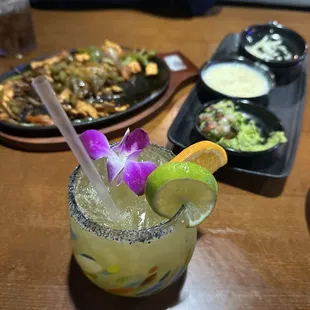 Chicken fajita, guac, queso dip and house margarita