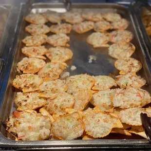 a tray of food being prepared