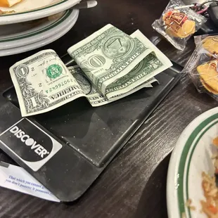 Her minimal tip even though she did nothing.