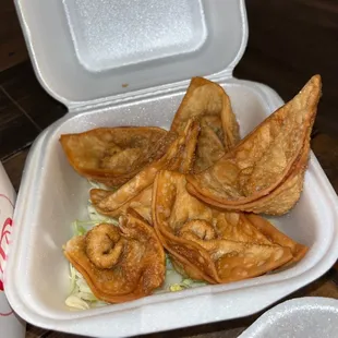 a close up of a tray of fried food