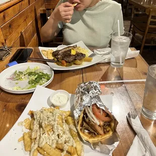 a woman eating at a restaurant
