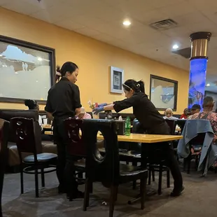 They're cleaning tables with the same gloves they use to refill drinks with. ????