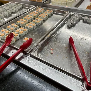 a variety of sushi rolls