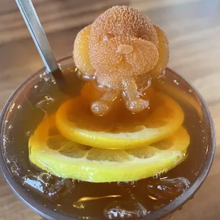 Lemon tea with little puppy ice