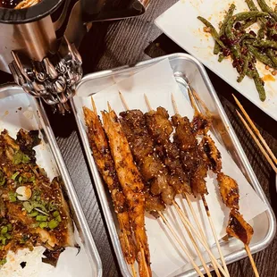 Grilled shrimp, beef, lamb and beef skewer