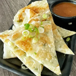 Crispy green onion pancake served with our special house sauce