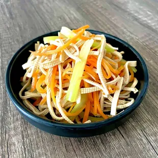 Soy noodle salad, light sesame oil, crunchy celery and carrot