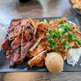 Fried Pork Chop with Minced Pork Belly on top of rice with egg