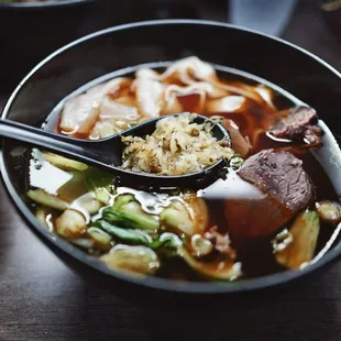 traditional beef noodle soup w half tendon half beef and thicccc noods