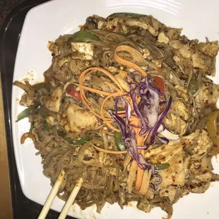 a plate of stir fried noodles