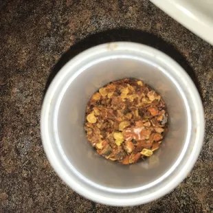 a bowl of food on a counter