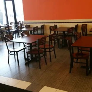 tables and chairs in a restaurant