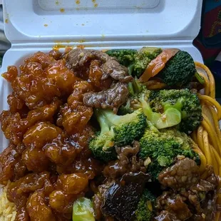 Orange chicken and beef with broccoli - half noodles and fried rice