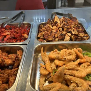 a variety of food items in a buffet