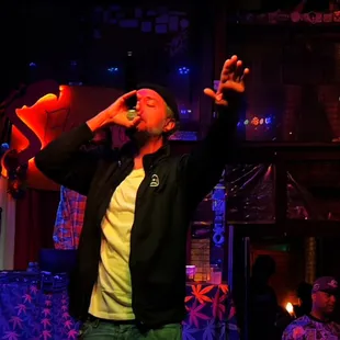 a man holding a flamingo