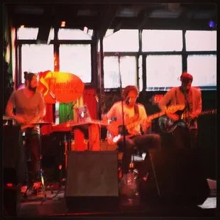 a group of people playing instruments