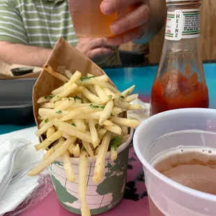 Truffle Fries and draft beer on the patio.