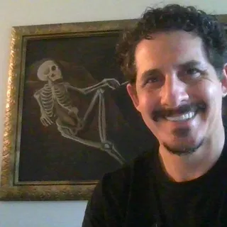 Kristofer R.