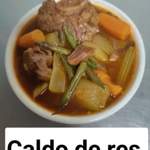 a bowl of stew with meat and vegetables