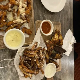 Zucchini fries (amazing), wings (ok) and truffle fries
