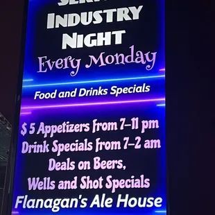 a sign for the service industry night