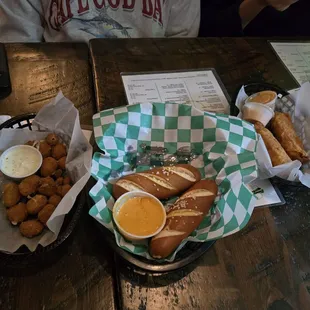 Cheese Curds, Bavarian pretzels and cheese and lastly rueben stuffed eag rolls