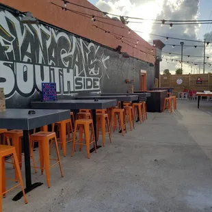 tables and orange stools